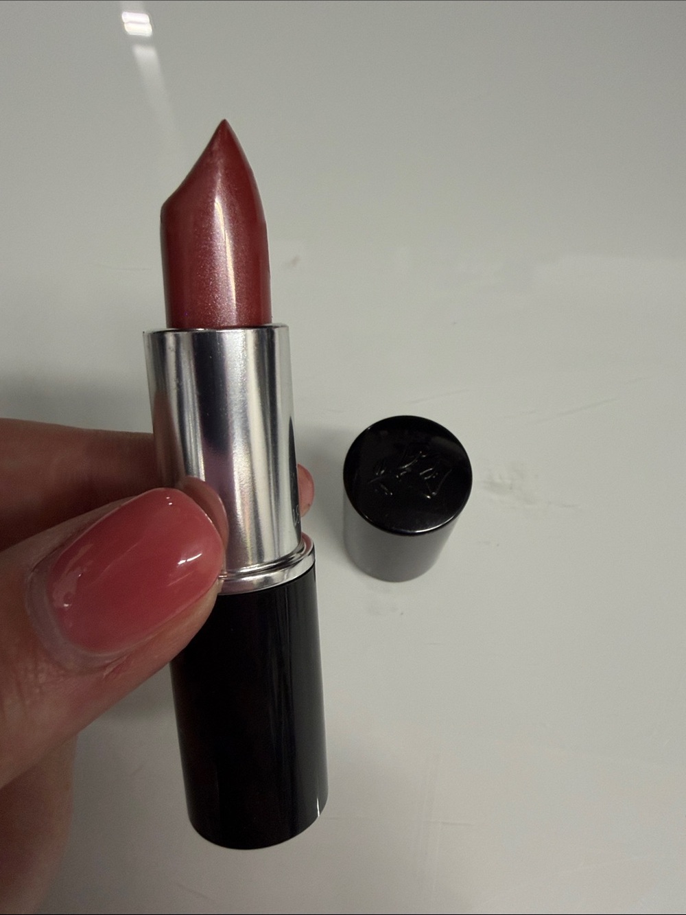 Lancome Color design lipstick in the shade designer bloom sheen